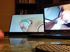 guy masturbates at his desk with computer