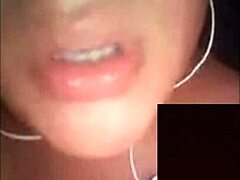 A beautiful woman broadcasts herself live on webcam, interacting with her audience in a sexy way.