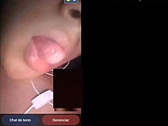 A beautiful woman broadcasts herself live on webcam, interacting with her audience in a sexy way.