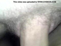 A british european couple enjoys a quiet evening together in their home.