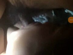 Wife gives husband BJ in intimate couple moment.