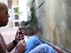 Housewife sweeping yard, showing pussy?