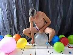 Horny Gay Dilf Richard Lennox Plays with Balloon Fetish