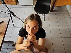 Blonde stepsister receives cum in mouth in the kitchen.