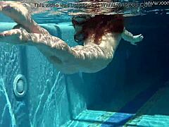 Is Nicole Pearl Shaking Her Ass In The Pool?