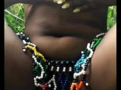 Hey check out this msanzi girl fingering her fine pussy outdoors in the forest