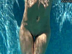 Is Nicole Pearl Shaking Her Ass In The Pool?