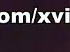 Girl in bathroom receives attention from guy