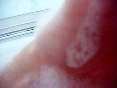 Annie Body Enjoys a Bath with Massive Bubbles While Fingering Her Petite Pussy Close-Up