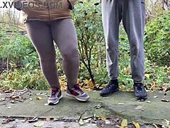 This curvy milf in leggings squatted and pissed right next to me outdoors.