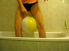 Is Sophie teasing her wet pussy with balloons in the living room and bathroom?