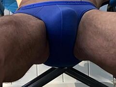 deep pelvic stretching in blue briefs on blue chair late october 2024