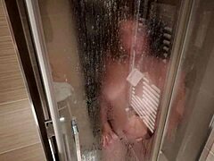 Big Breasted European Milf Shaves Hairy Pussy in Shower.