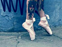 Ballerina In Ballet Shoes Walking Down Street