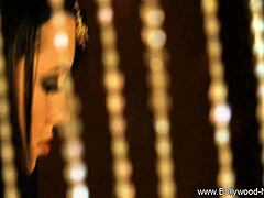 Beautiful Indian Brunette Teases with Striptease and Undressing in Bollywood Style