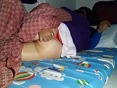 Hey, sharing a bed with my horny stepmom led to an unexpected creampie under the sheets!