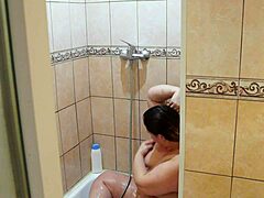 What happens when home cam catches chubby milf shaving in shower