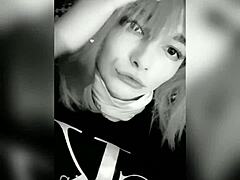 oh man, i can't believe this shemale is shoving a huge dildo right in her ass