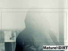 Brunette woman caught on hidden camera during private moments.