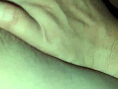 Young woman engaging in solo masturbation in private