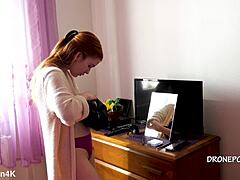 Beautiful naked redhead Karolinka applies makeup with cute European charm and small tits