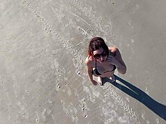 Redhead Latina Walks On Beach Publicly