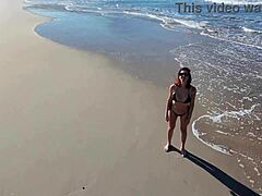 Redhead Latina Walks On Beach Publicly