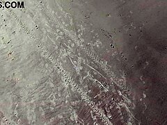 Redhead Latina Walks On Beach Publicly