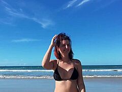 Redhead Latina Walks On Beach Publicly