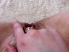 Hairy pussy brunette squirts while getting fucked in the ass and fingering her clit to orgasm.