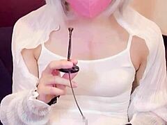 Masked asian beauty crossdresses and masturbates on stream