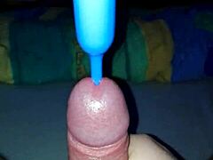 handjob with a plug-in leads to a big cumshot