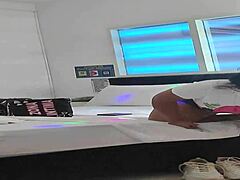 A mature latina amateur shares a homemade moment with her young step-nephew.