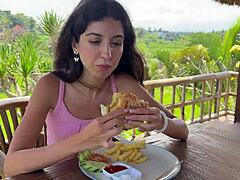 Cute Girl Eating Burger With Cum On Her Face In Public Cafe