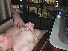 Grandmother feels intense pleasure while naked masturbating to orgasm in hotel at night