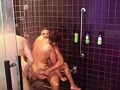 suggestive orgy in the shower with spanking