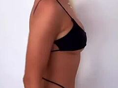 boutinela in black bikini dancing in club