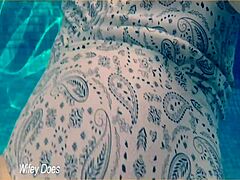 Milf Flashes Tits In Hotel Pool?