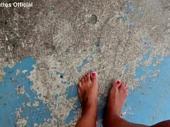 Dirty Wet Barefoot Feet on the Street