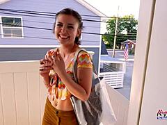 Petite brunette coed Wendy enjoys a juicy treat with her tattoo