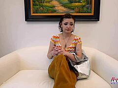 Petite brunette coed Wendy enjoys a juicy treat with her tattoo