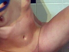 showering latex brunette